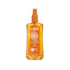 Refect Beauty Calypso Carrot Oil SPF15 tanning spray in a clear bottle with an orange pump for golden skin results.
