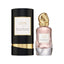 Refect Beauty Donna Karan Cashmere & Wild Fig Eau de Parfum bottle and black cylindrical box with gold accents.