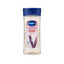 Refect Beauty Vaseline Intensive Care Essential Even Tone body oil in a clear 200ml bottle with a blue cap.