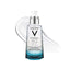 Refect Beauty Vichy Mineral 89 hydrating and plumping facial serum bottle with a clear gel texture splash behind it.