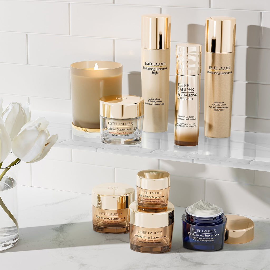Refect Beauty collection of Estée Lauder Revitalizing Supreme+ skincare products with gold packaging on a shelf