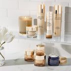 Refect Beauty collection of Estée Lauder Revitalizing Supreme+ skincare products with gold packaging on a shelf