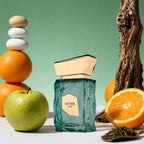 Refect Beauty French Avenue Aether Extrait de Parfum bottle with green glass, gold cap, and fresh fruit accents.