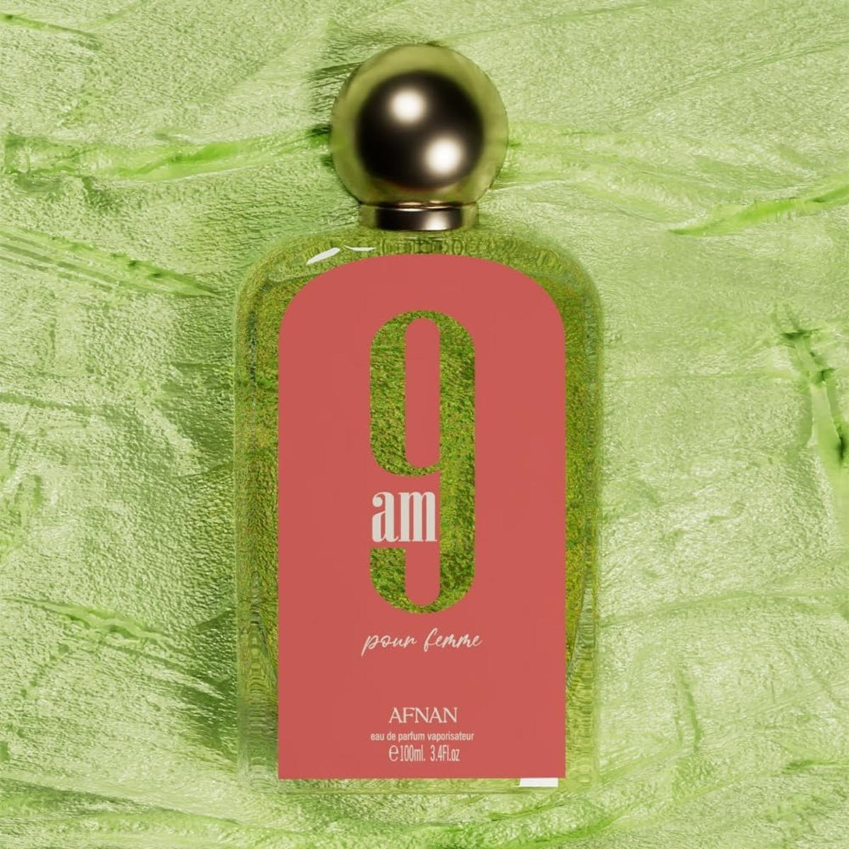 Refect Beauty Afnan 9AM Pink Femme eau de parfum bottle with a pink label against a textured light green background