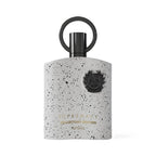 Refect Beauty Afnan Supremacy Collector's Edition Eau de Parfum in a white speckled bottle with a black ring cap.