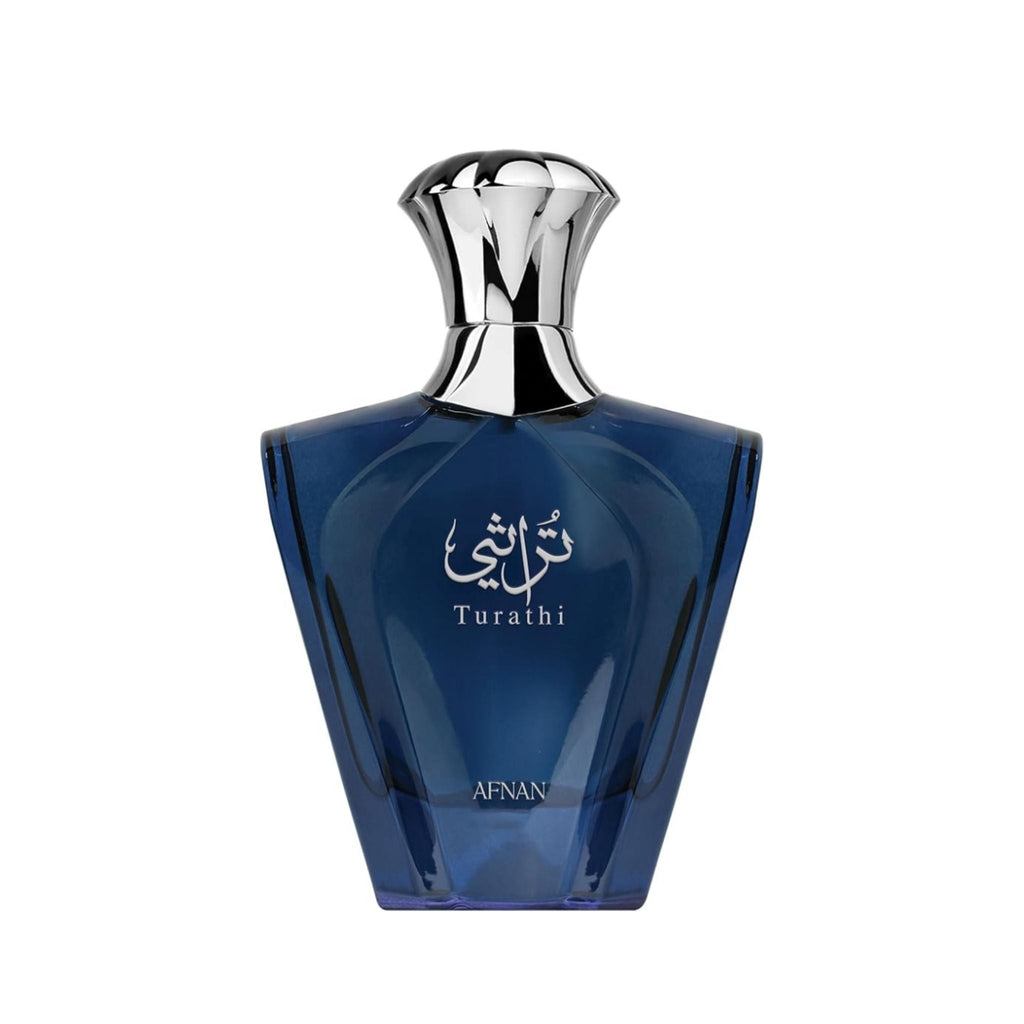 Refect Beauty Afnan Turathi Blue Eau de Parfum in a deep blue geometric glass bottle with a silver metallic cap.