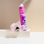 Refect Beauty Agrado 2-in-1 floral dry shampoo and conditioner spray can next to a white poppy flower