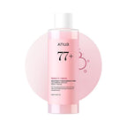 Refect Beauty Anua Peach 77 Niacin Essence Toner in a clear bottle with light pink liquid and white cap.