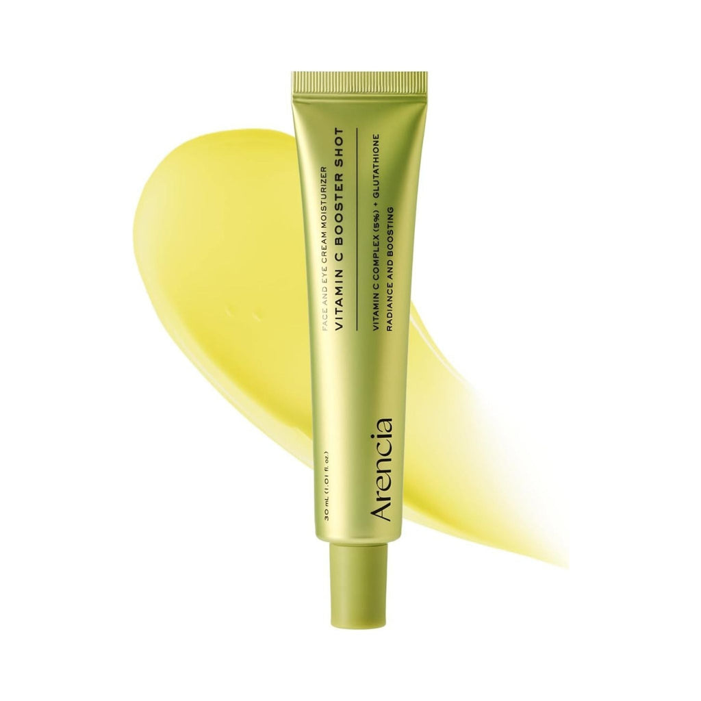 Refect Beauty Arencia Vitamin C Booster Shot facial serum in a green tube with a yellow cream swatch behind it.
