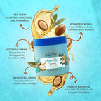 Refect Beauty Les Karites Argan Oil Hair Mask jar surrounded by argan nuts and golden oil splashes on a blue background