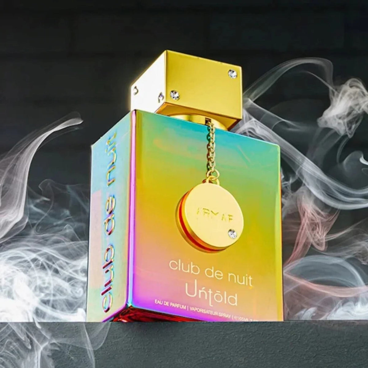 Refect Beauty Armaf Club De Nuit Untold unisex eau de parfum in a vibrant iridescent bottle with gold accents.