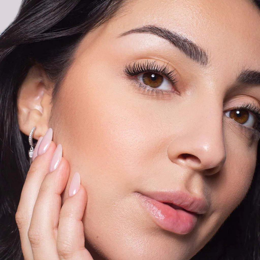 Refect Beauty Astra Blush Expert applied on a model's cheek for a natural matte finish and sculpted complexion