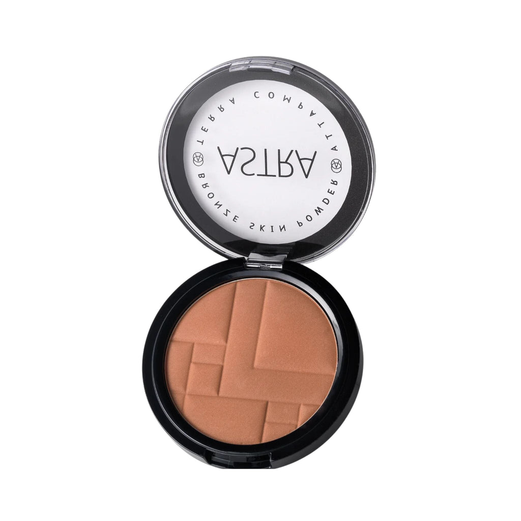 Refect Beauty Astra Bronze Skin Powder in a round compact with a geometric embossed pattern for a radiant tan finish.