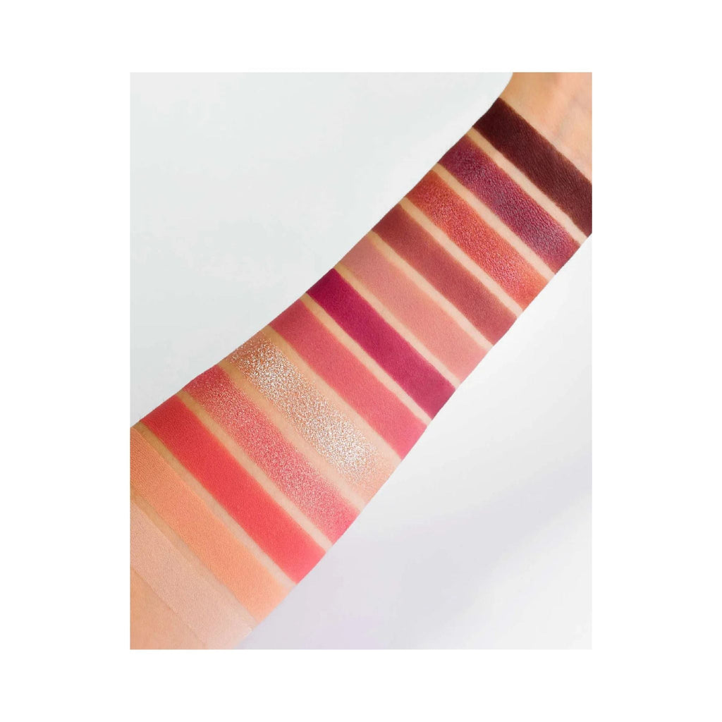 Refect Beauty Astra Cherry Temptation eyeshadow palette swatches on arm showing pink, mauve, and berry matte shades