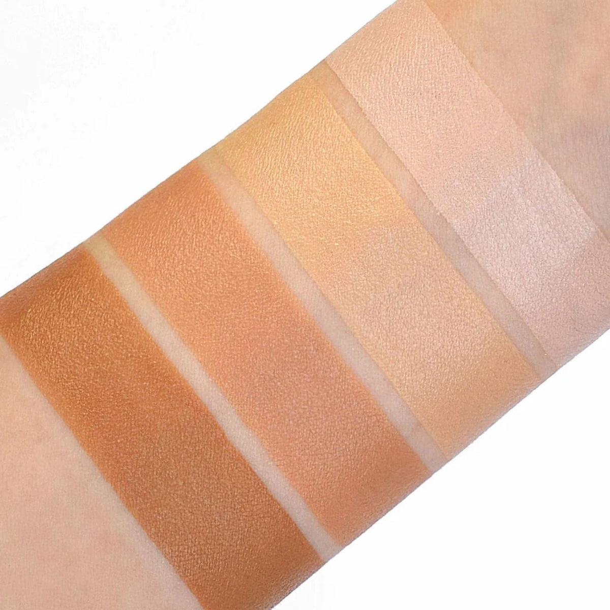 Refect Beauty Astra Concealer cream swatches showing four different skin tone shades on a forearm