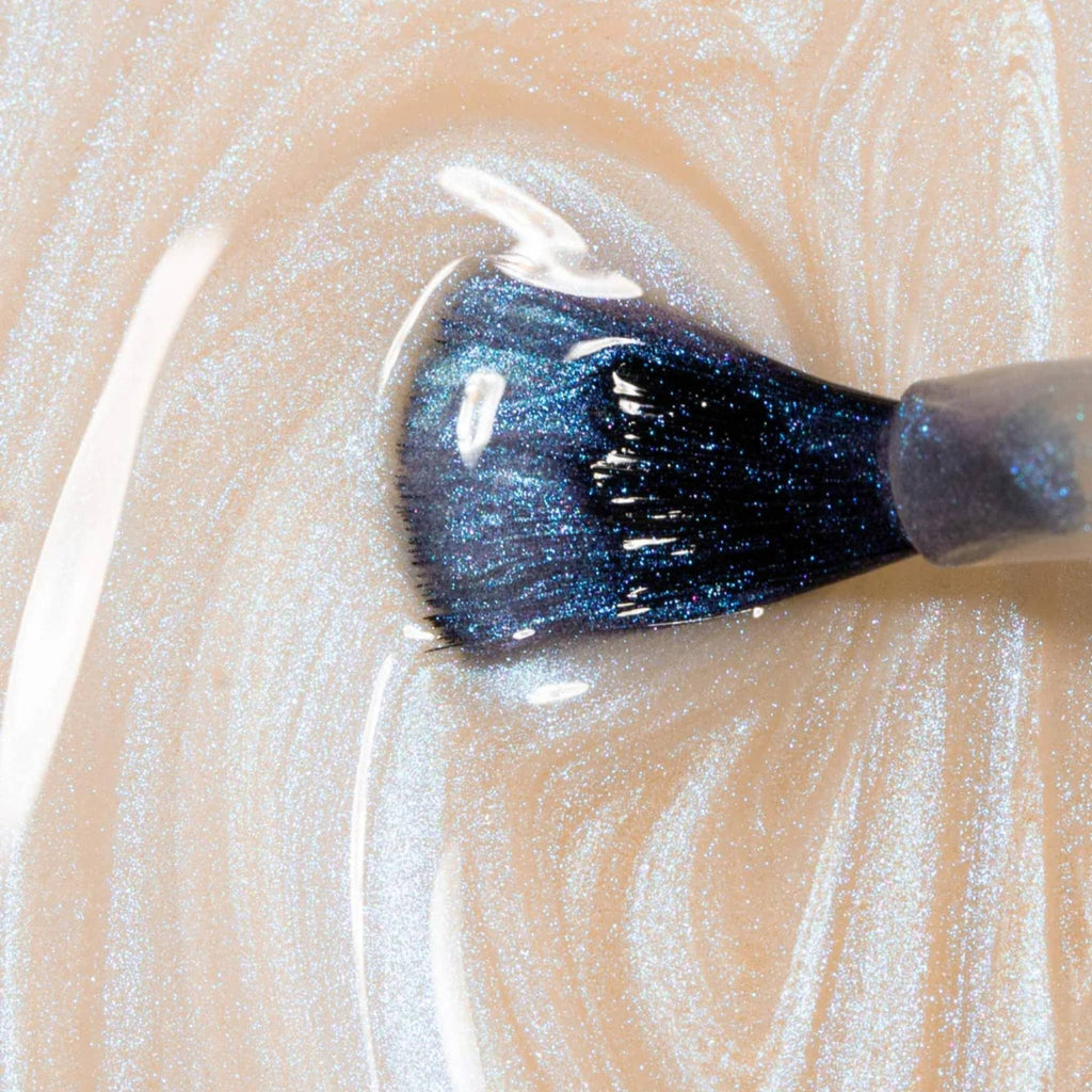 Refect Beauty Astra Lasting Gel Effect nail polish brush with shimmering dark blue pigment in a pearlescent base