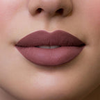 Refect Beauty Astra Hypnotize liquid lipstick in a matte mauve shade applied on model lips for a defined look