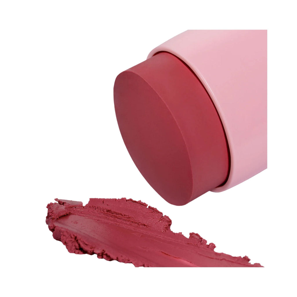 Refect Beauty Astra Identistick blush stick in a deep rose shade with a creamy texture swatch on a white background.