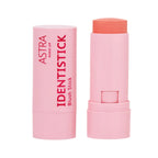 Refect Beauty Astra Identistick blush stick in a soft pink twist-up tube with a vibrant coral cream blush shade. 01