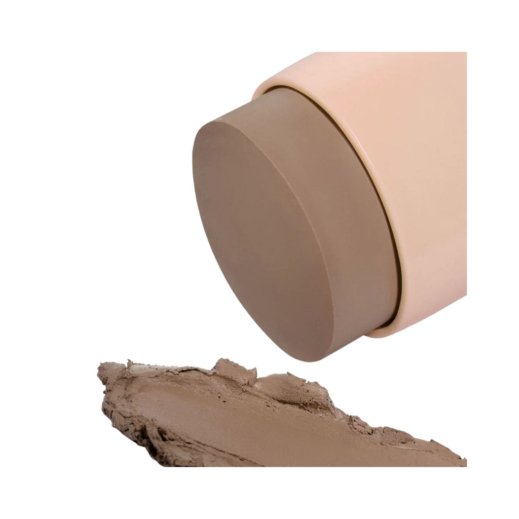 Refect Beauty Astra Identistick contour stick with a creamy brown shade and a smooth swatch on a white background