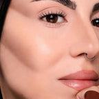Refect Beauty model showing natural contouring on cheekbones using Astra Identistick creamy contour stick