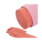 Refect Beauty Astra Identistick blush stick in a soft peach shade with a creamy texture swatch on a white background.