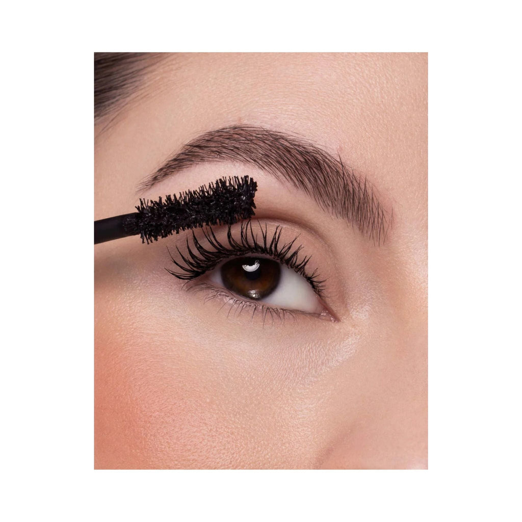 Refect Beauty Astra Instavolume mascara being applied with an hourglass fiber brush for volumized black lashes