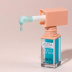 Refect Beauty Astra Pure Beauty Juicy Lip Oil in Forest Mint with a blue tint and applicator dripping product