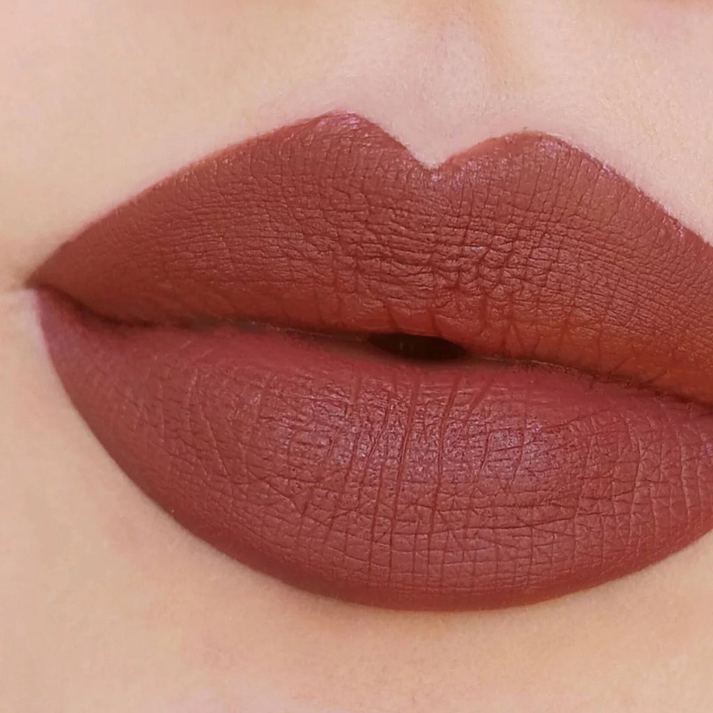 Refect Beauty Astra Jumbo Lipstick in a rich matte brown shade applied on lips for a smooth and defined look