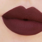 Refect Beauty Astra Jumbo Lipstick in a deep matte burgundy shade applied to lips for a smooth and defined look