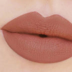 Refect Beauty Astra Jumbo Lipstick in a matte nude brown shade applied on lips for a smooth and defined finish