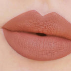 Refect Beauty Astra Jumbo Lipstick in a matte nude brown shade applied on lips for a smooth and defined finish
