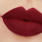 Refect Beauty Astra Jumbo Lipstick in a deep matte red shade applied precisely on lips for a smooth finish