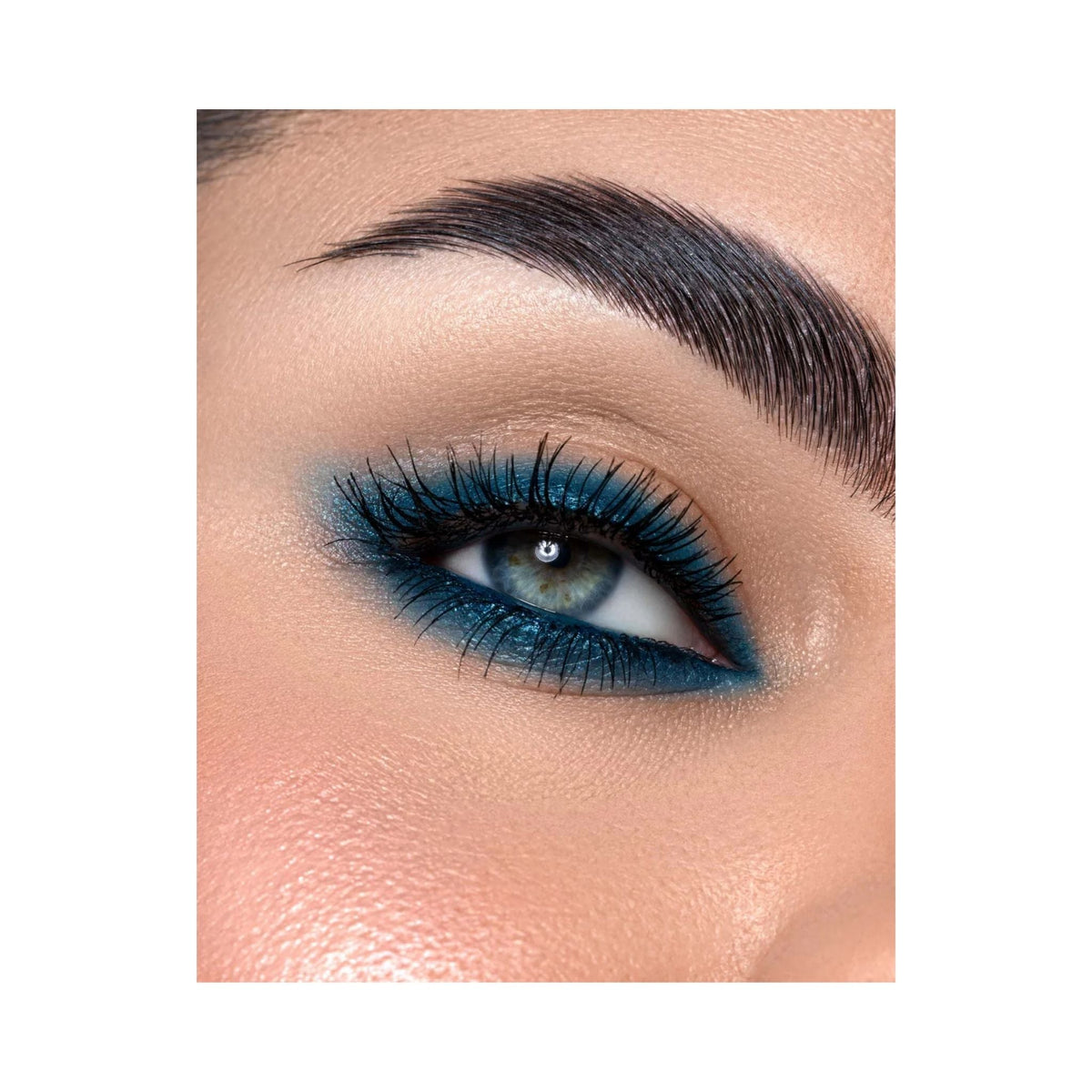 Refect Beauty Astra Kohl Color kajal eye pencil applied in an intense metallic blue shade on the upper and lower lash line