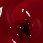 Refect Beauty Astra Lasting Gel Effect nail polish in a deep red shade with a glossy, high-shine finish.