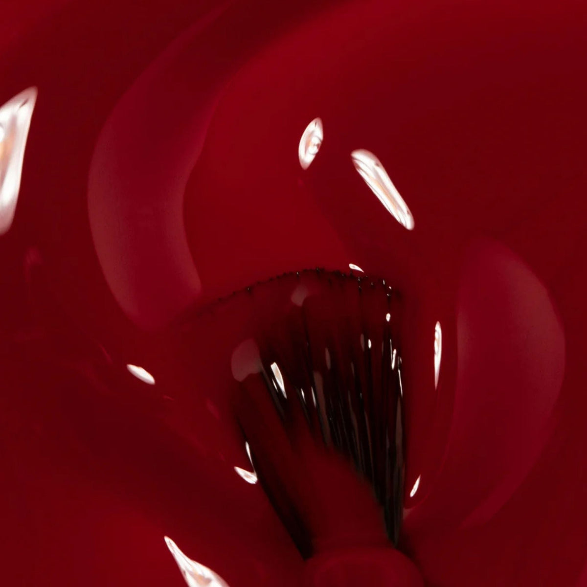 Refect Beauty Astra Lasting Gel Effect nail polish in a deep red shade with a glossy, high-shine finish.