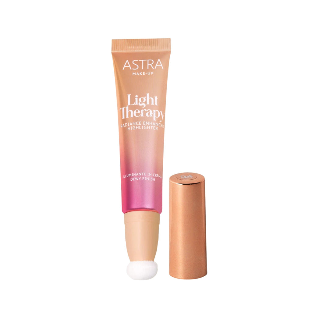 Refect Beauty Astra Light Therapy liquid highlighter in a pink and gold tube with a sponge applicator tip. 04