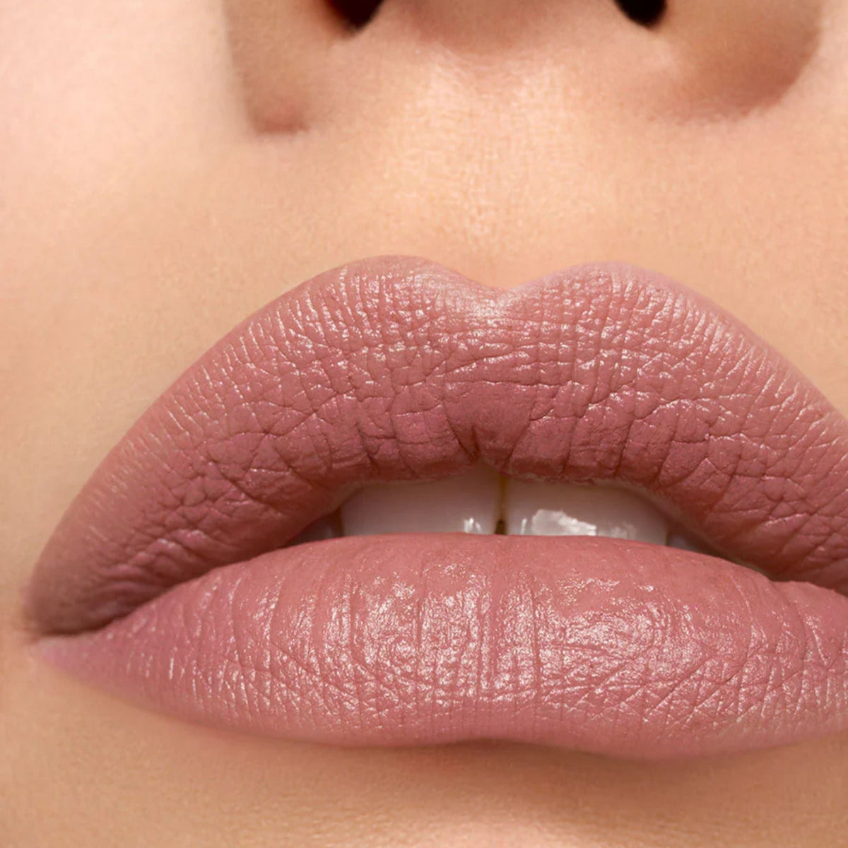 Refect Beauty Astra Lip Creamynal lipstick in a creamy mauve nude shade applied on lips for a luminous finish