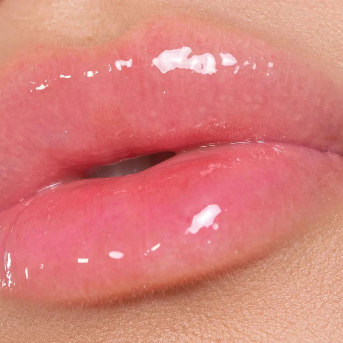 Refect Beauty Astra My Gloss Light & Shine lip gloss applied on lips for a smooth, radiant, and non-sticky finish.