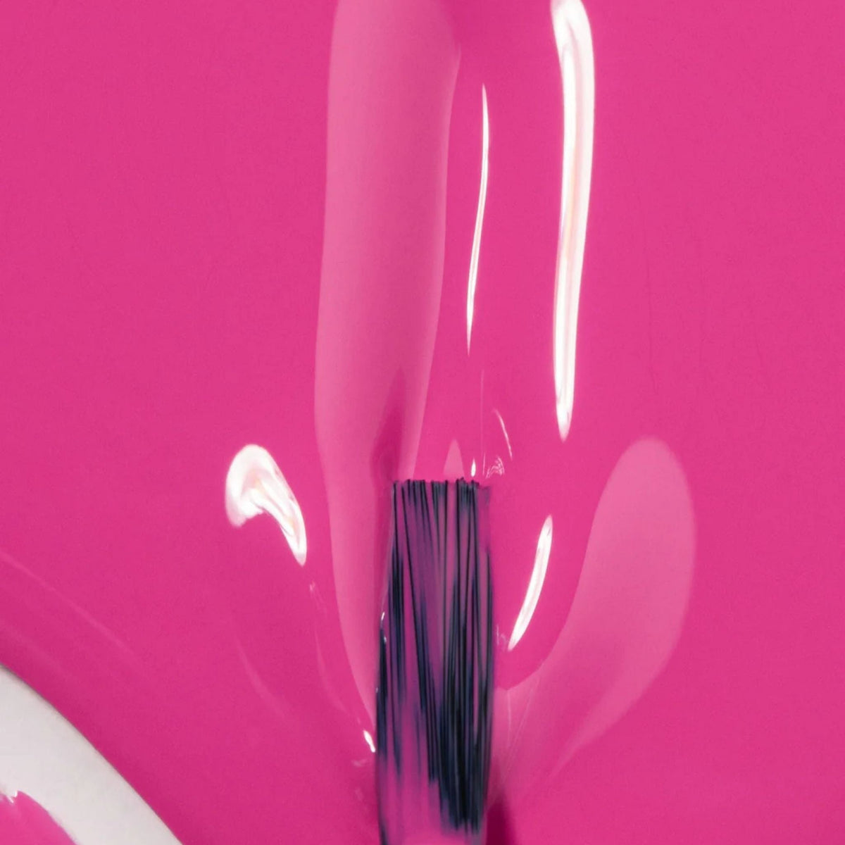Refect Beauty Astra My Laque nail polish in a vibrant hot pink shade with a glossy, high-shine finish on a brush.