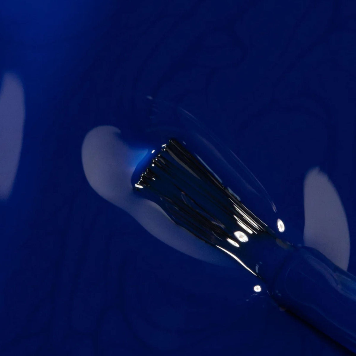 Refect Beauty Astra My Laque nail polish in a vibrant, glossy royal blue shade with an applicator brush