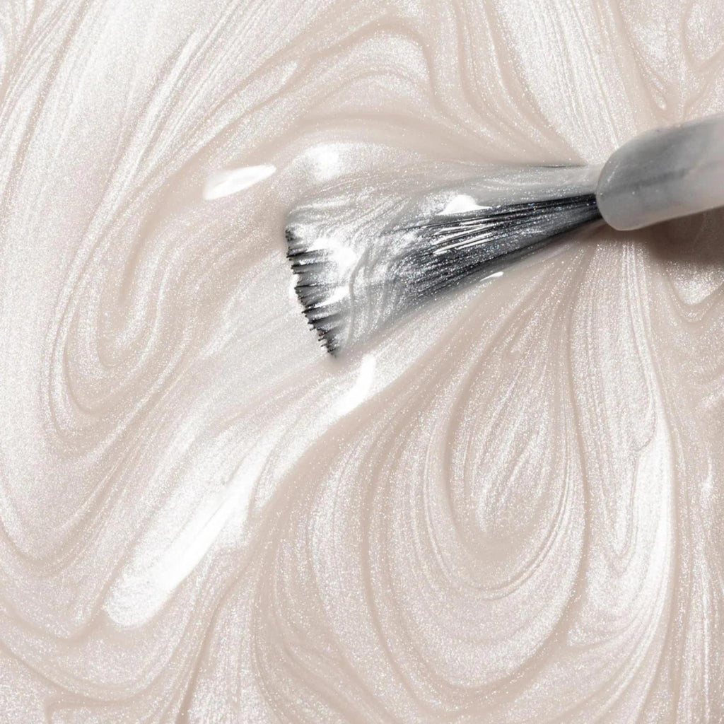 Refect Beauty Astra My Laque nail polish in a shimmering pearlescent white shade with a glossy, swirling texture.
