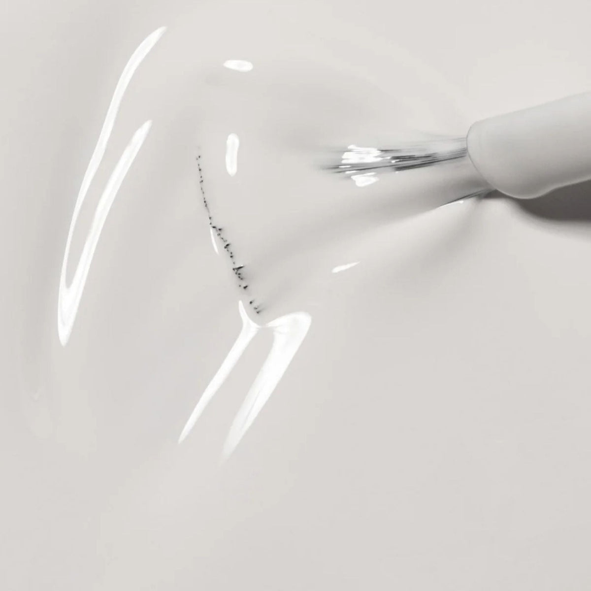 Refect Beauty Astra My Laque white nail polish showing a smooth glossy texture and brush application