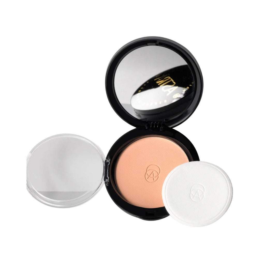 Refect Beauty Astra Natural Skin Powder in a black compact case with a mirror, clear lid, and soft application puff. 32