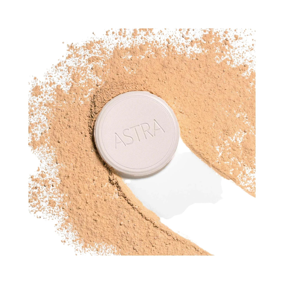 Refect Beauty Astra Natural Skin Powder in a compact case surrounded by loose beige face powder on a white background