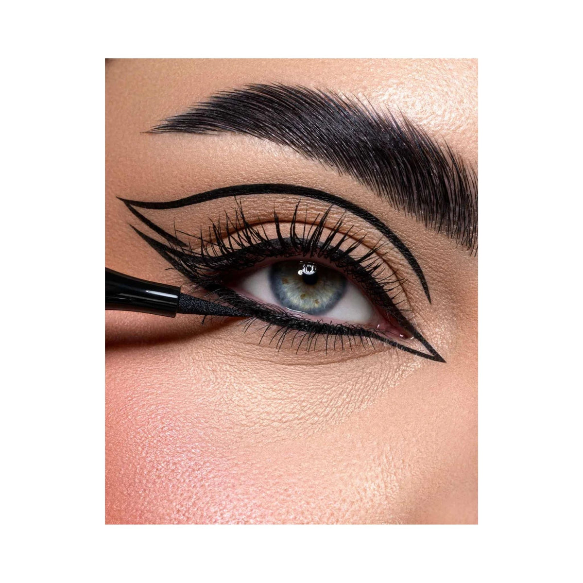 Refect Beauty Astra Subliminal 16H Pro-Liner creating a precise black graphic eyeliner look on a model's eyelid