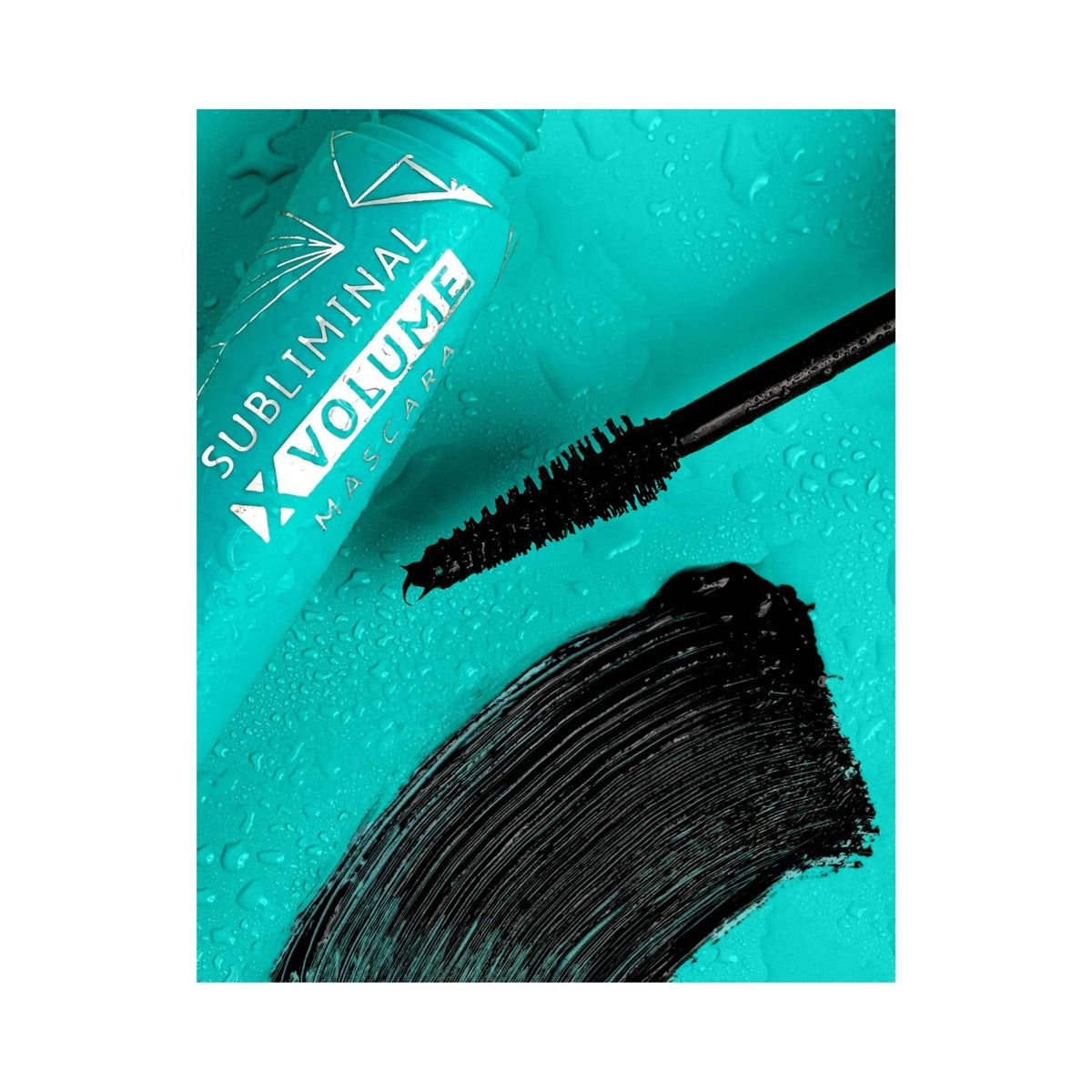 Refect Beauty Astra Subliminal X Volume waterproof mascara tube with black wand and swatch on a wet turquoise surface