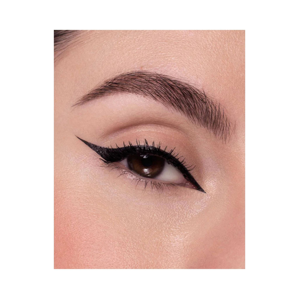 Refect Beauty Astra Vinyl Black eyeliner applied with a precise, high-gloss winged tip on an eye.