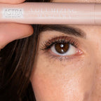 Refect Beauty Astra Pure Beauty Volumizing Mascara applied to a model's lashes for a natural, defined look.