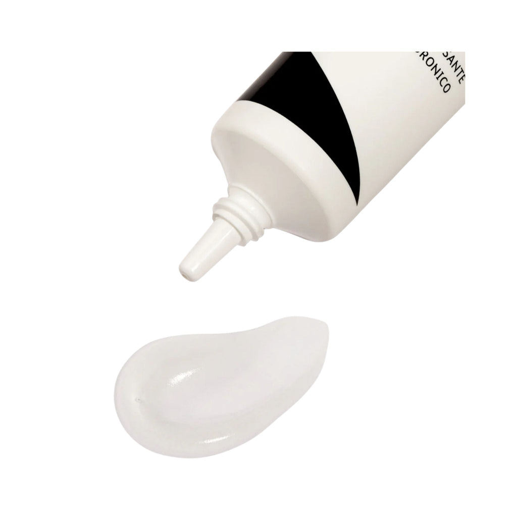 Refect Beauty Astra Zen Routine face primer in a white squeeze tube with a clear gel texture swatch on a white background